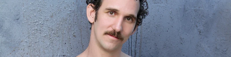 Adult model Greg McKeon in a neutral head and shoulders portrait