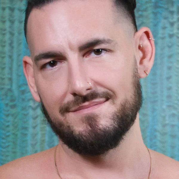 Adult model Derek Allen in a neutral head and shoulders portrait